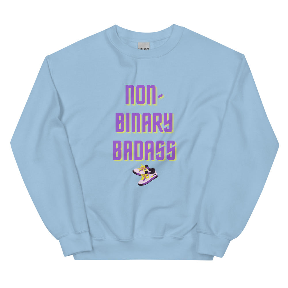 Light blue crewneck sweatshirt reading “non-binary badass” with a sneaker graphic