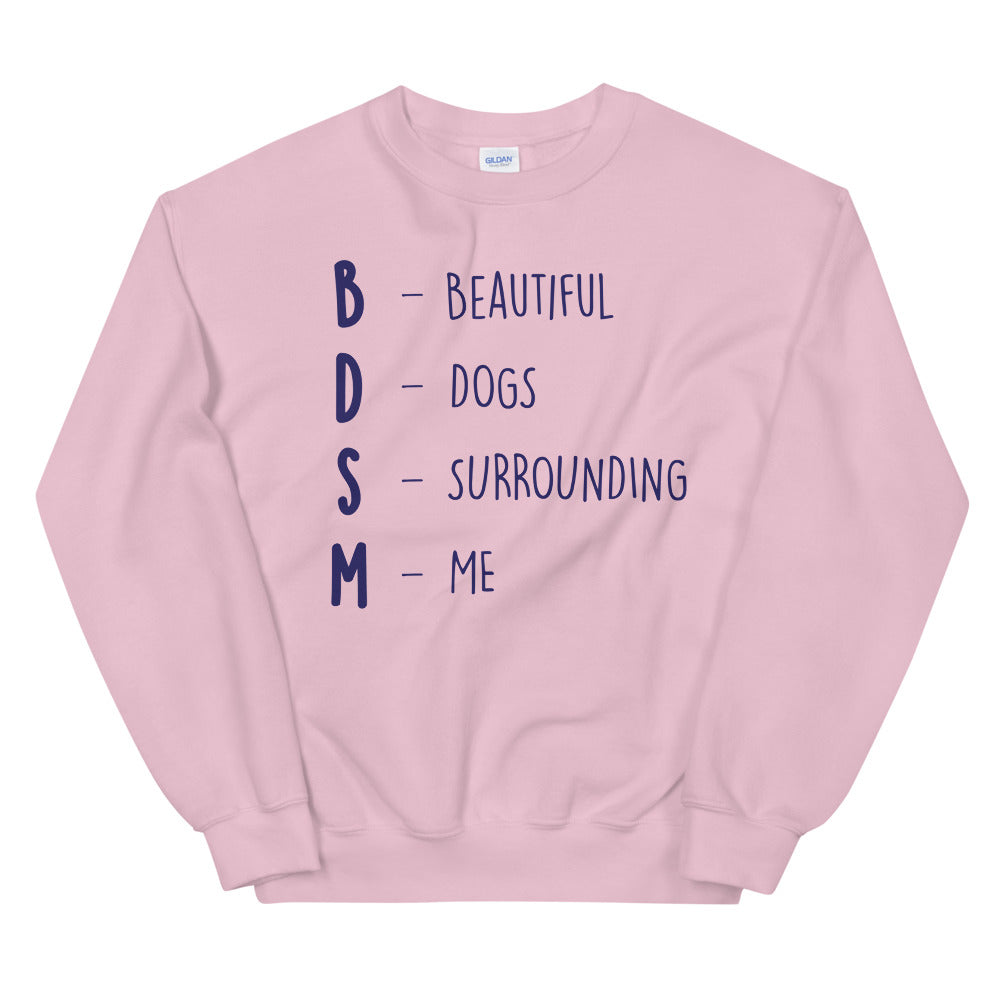 Pink sweatshirt reading “BDSM – Beautiful Dogs Surrounding Me” in navy lettering