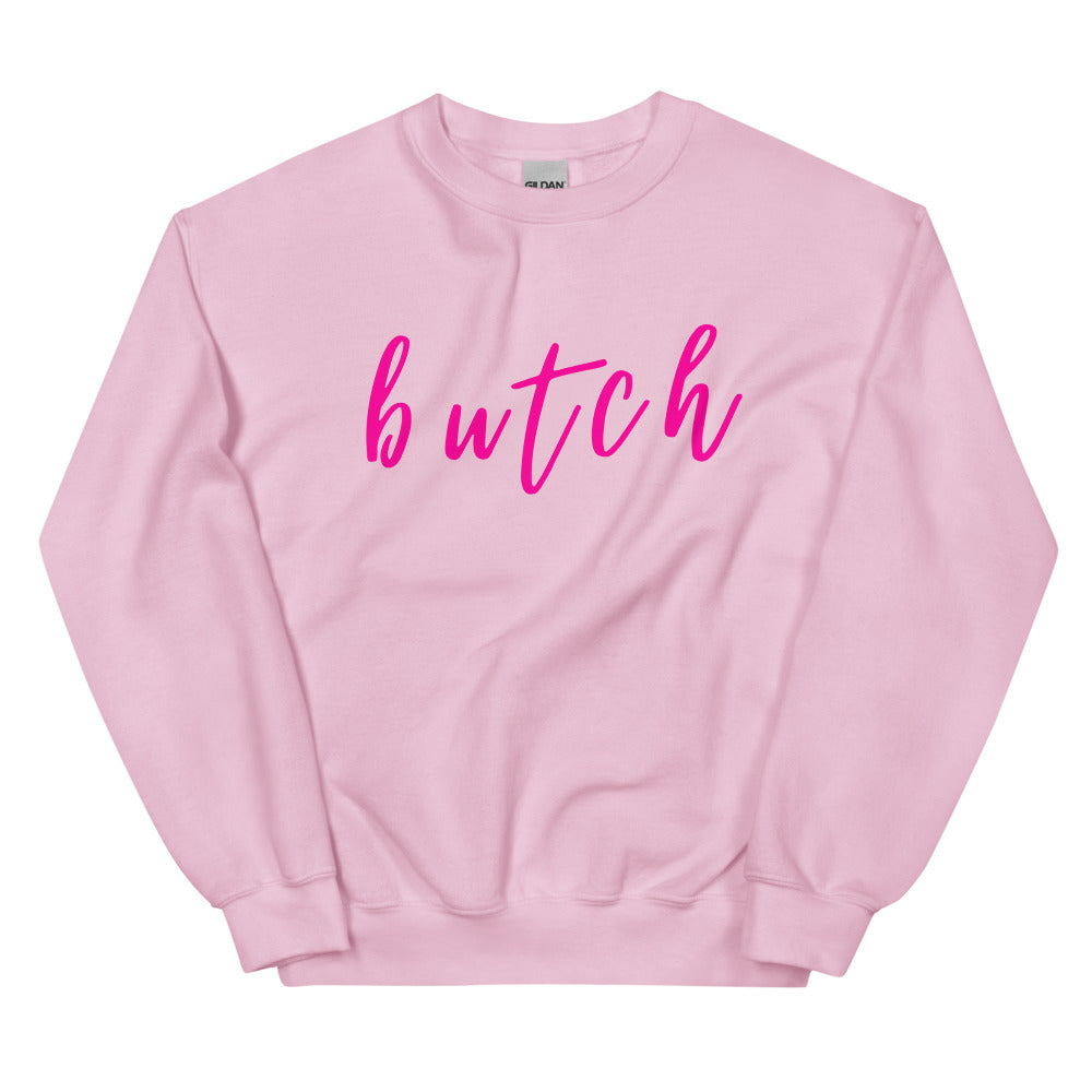 Front view of a pink sweatshirt with bright pink script reading “butch”
