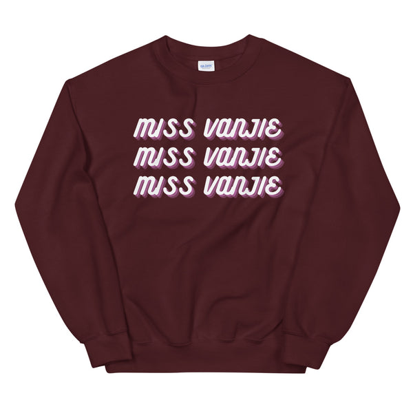Maroon sweatshirt with three repeated white and pink “MISS VANJIE” chest prints