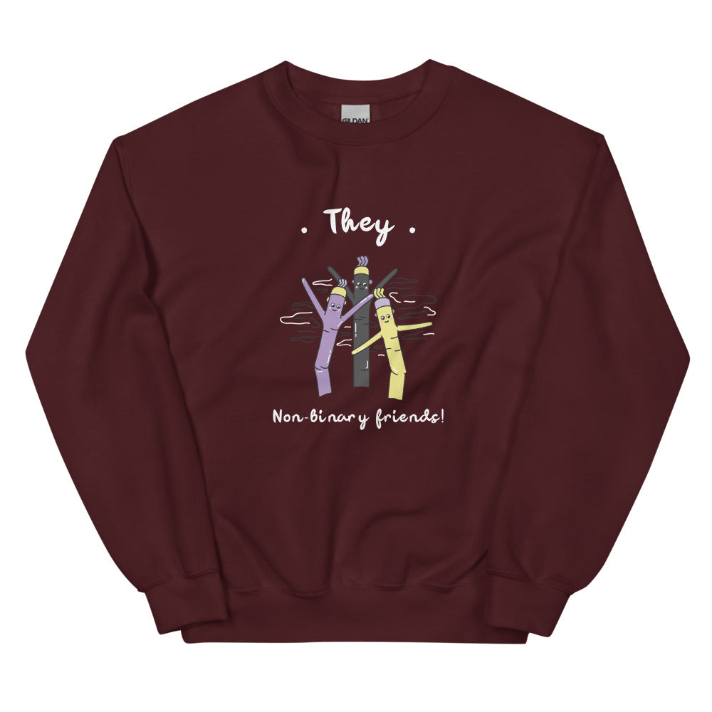 Maroon sweatshirt with “They” above three colorful figures and “Non-binary friends!” below