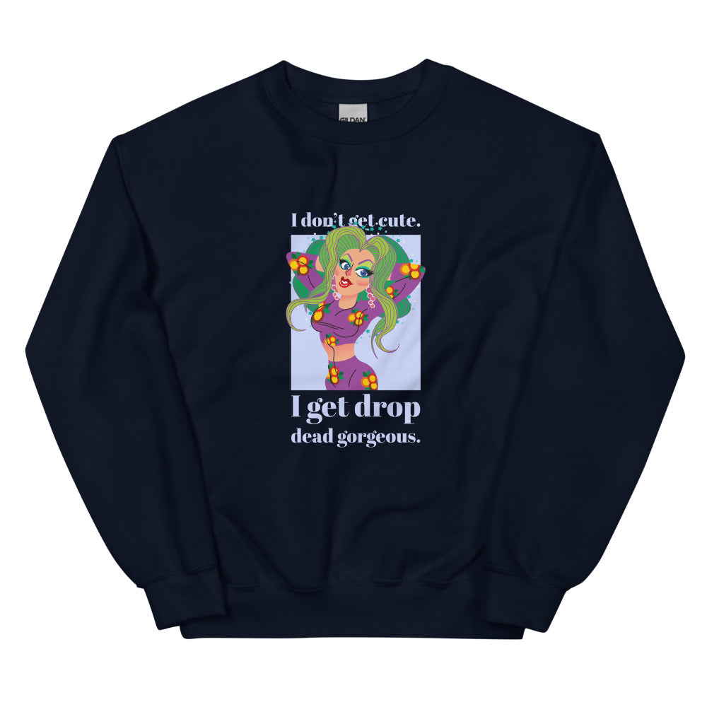 Navy sweatshirt with a colorful drag-style figure and “I don’t get cute. I get drop dead gorgeous.”