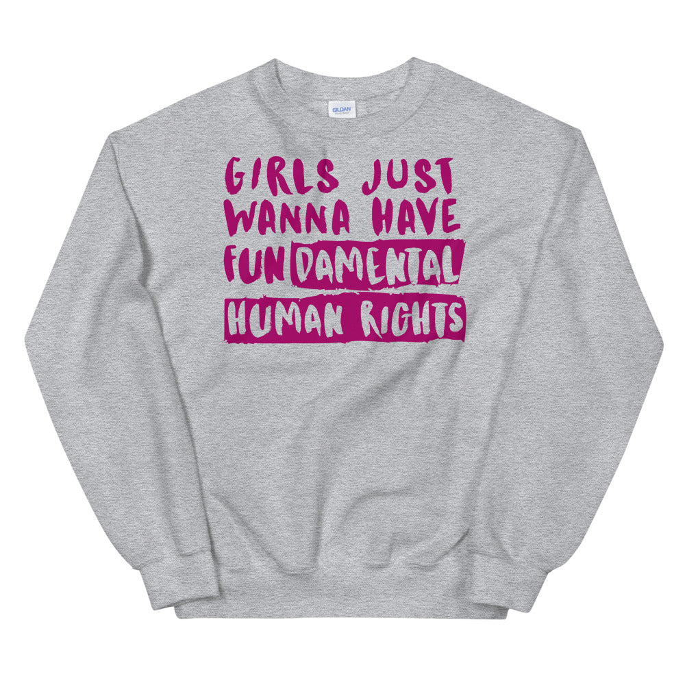 Gray sweatshirt with magenta text reading “Girls Just Wanna Have Fundamental Human Rights”