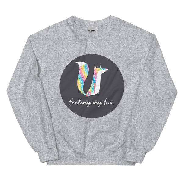 Flat-lay gray sweatshirt with a colorful fox graphic and “feeling my fox” text