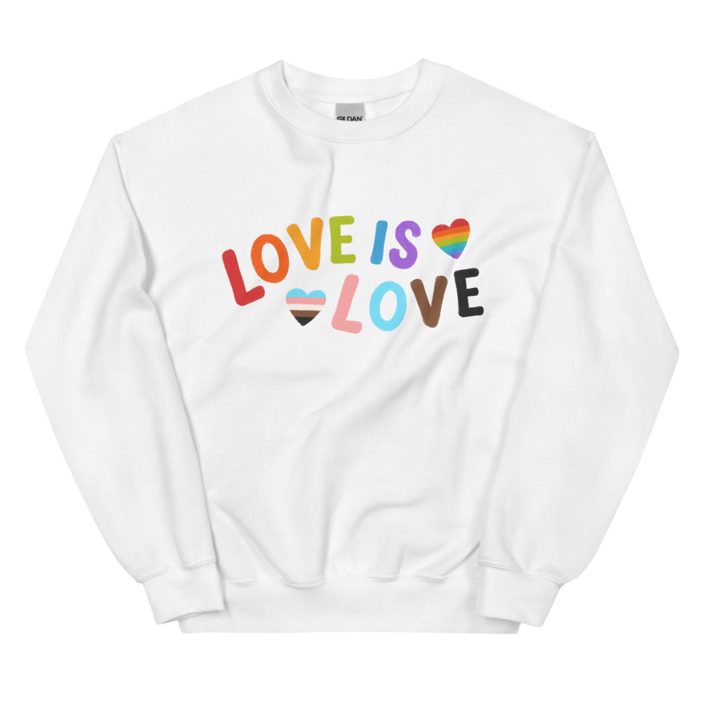 White sweatshirt with colorful “LOVE IS LOVE” lettering and rainbow-striped heart graphics