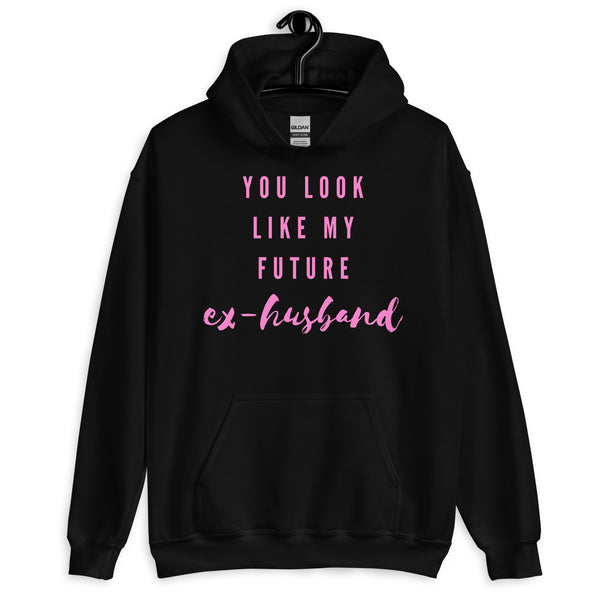 Front view of a black hoodie reading “YOU LOOK LIKE MY FUTURE ex-husband” in pink