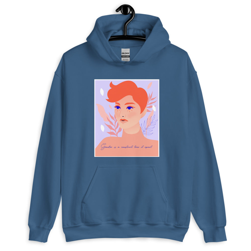 Front view of a blue hoodie with a portrait graphic and “Gender is a construct, tear it apart”