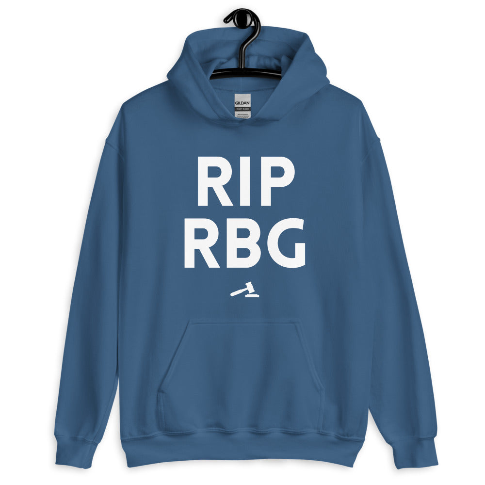 Front view of a blue pullover hoodie reading “RIP RBG” above a gavel icon