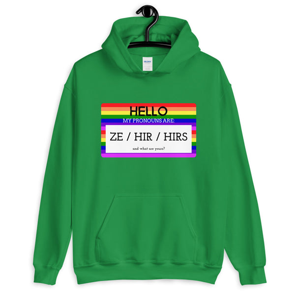 Green unisex hoodie with rainbow-striped pronoun graphic reading “ZE / HIR / HIRS”