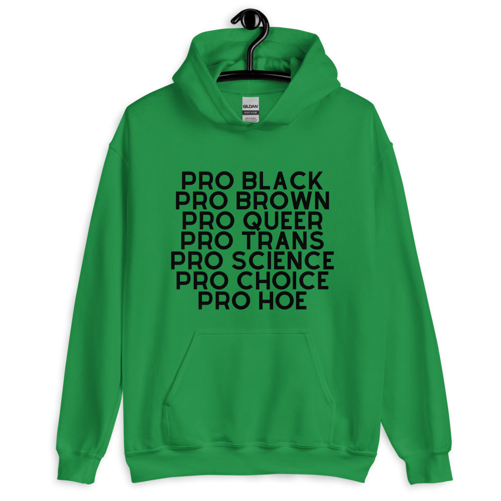 Front-facing green hoodie on a hanger with black text: “PRO BLACK PRO BROWN PRO QUEER PRO TRANS PRO SCIENCE PRO CHOICE PRO...