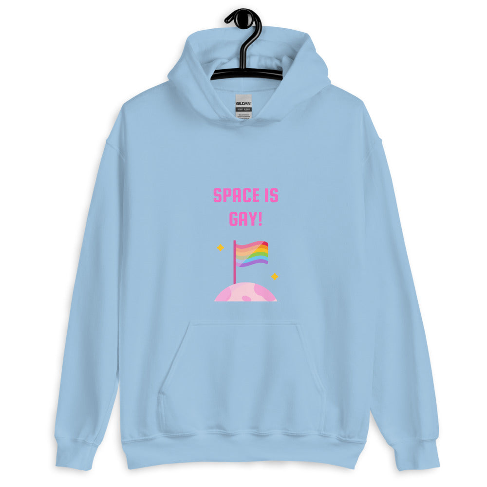 Light blue hoodie with pink “SPACE IS GAY!” text and a rainbow flag on a planet
