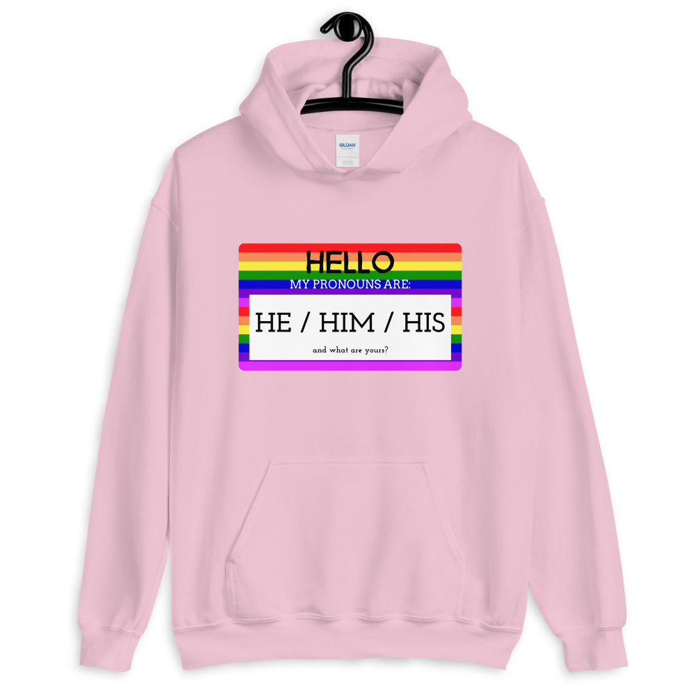 Pink hoodie with rainbow pronoun graphic reading “HE / HIM / HIS”