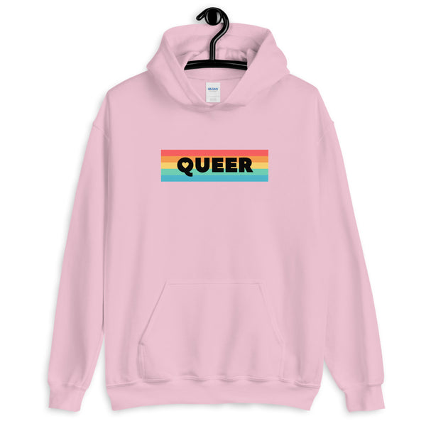 Pink unisex hoodie with a rainbow-striped chest graphic reading “QUEER”