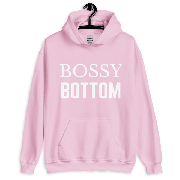 Front-facing light pink hoodie with white “BOSSY BOTTOM” lettering and a kangaroo pocket