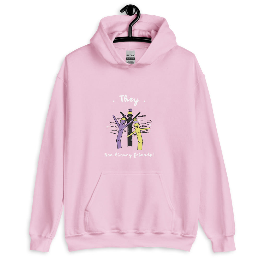 Front view of a pink hoodie reading “They” and “Non-binary friends!” with cartoon pencils