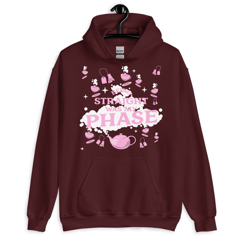Maroon pullover hoodie with pink tea-themed graphic reading “Being Straight Was My Phase”