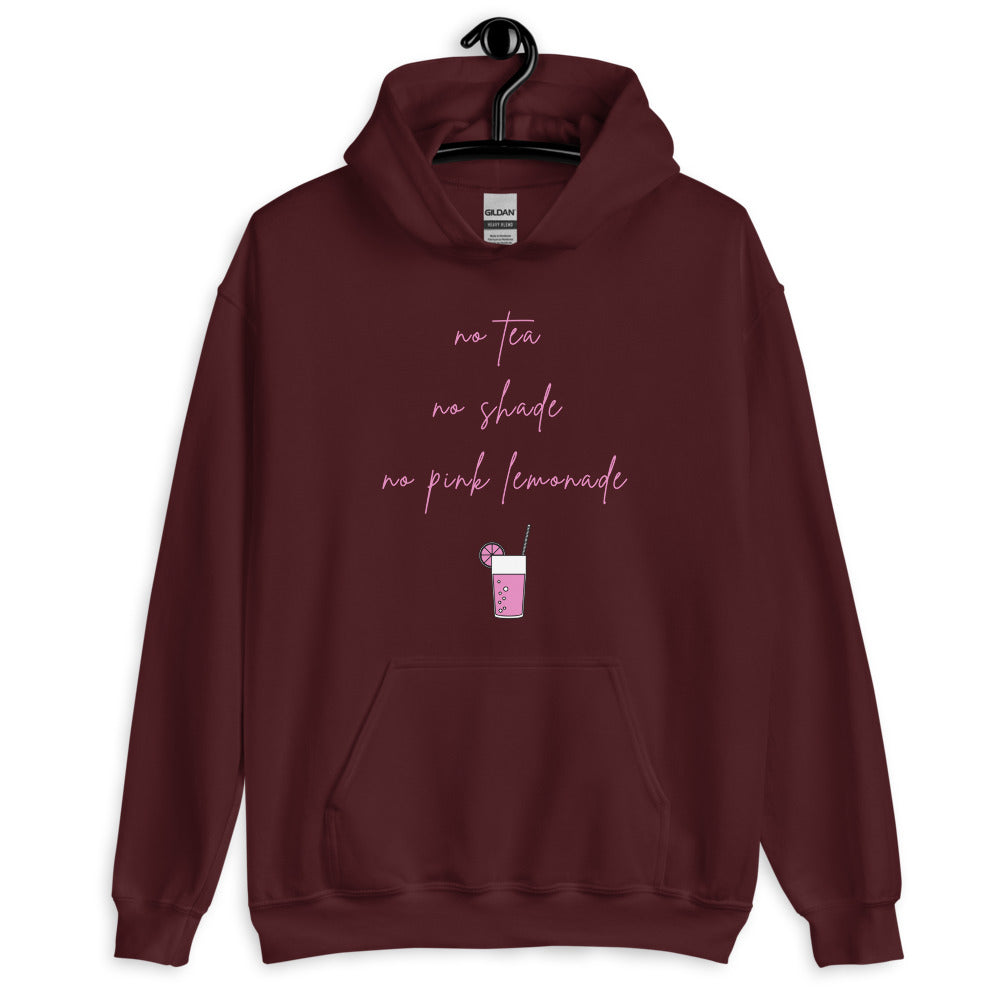 Front view of a burgundy hoodie reading “no tea, no shade, no pink lemonade” with a drink graphic