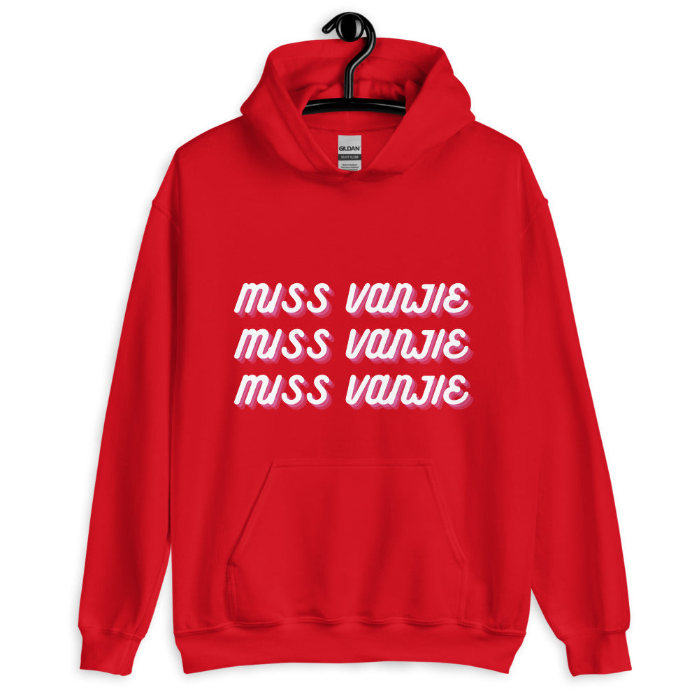 Front-facing red pullover hoodie with three stacked “MISS VANJIE” lines in white and pink