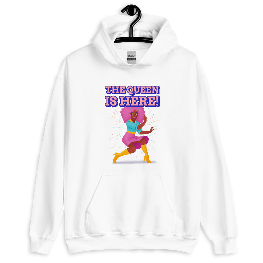 Front view of a white hoodie reading “THE QUEEN IS HERE!” with a colorful dancing figure