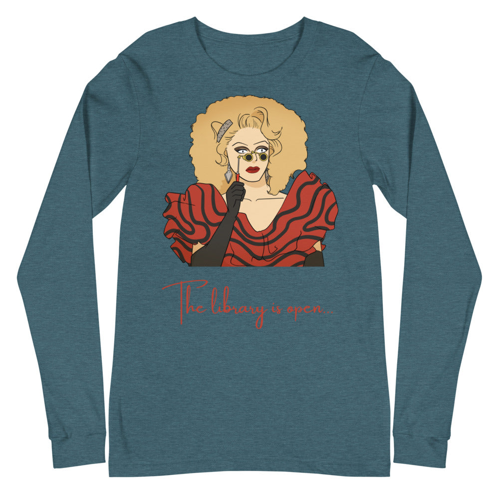 Flat-lay teal long-sleeve shirt with drag performer illustration and “The library is open...” text