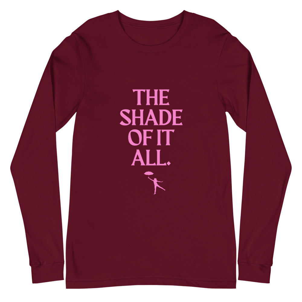 Flat-lay maroon long-sleeve shirt with pink “THE SHADE OF IT ALL.” lettering and figure