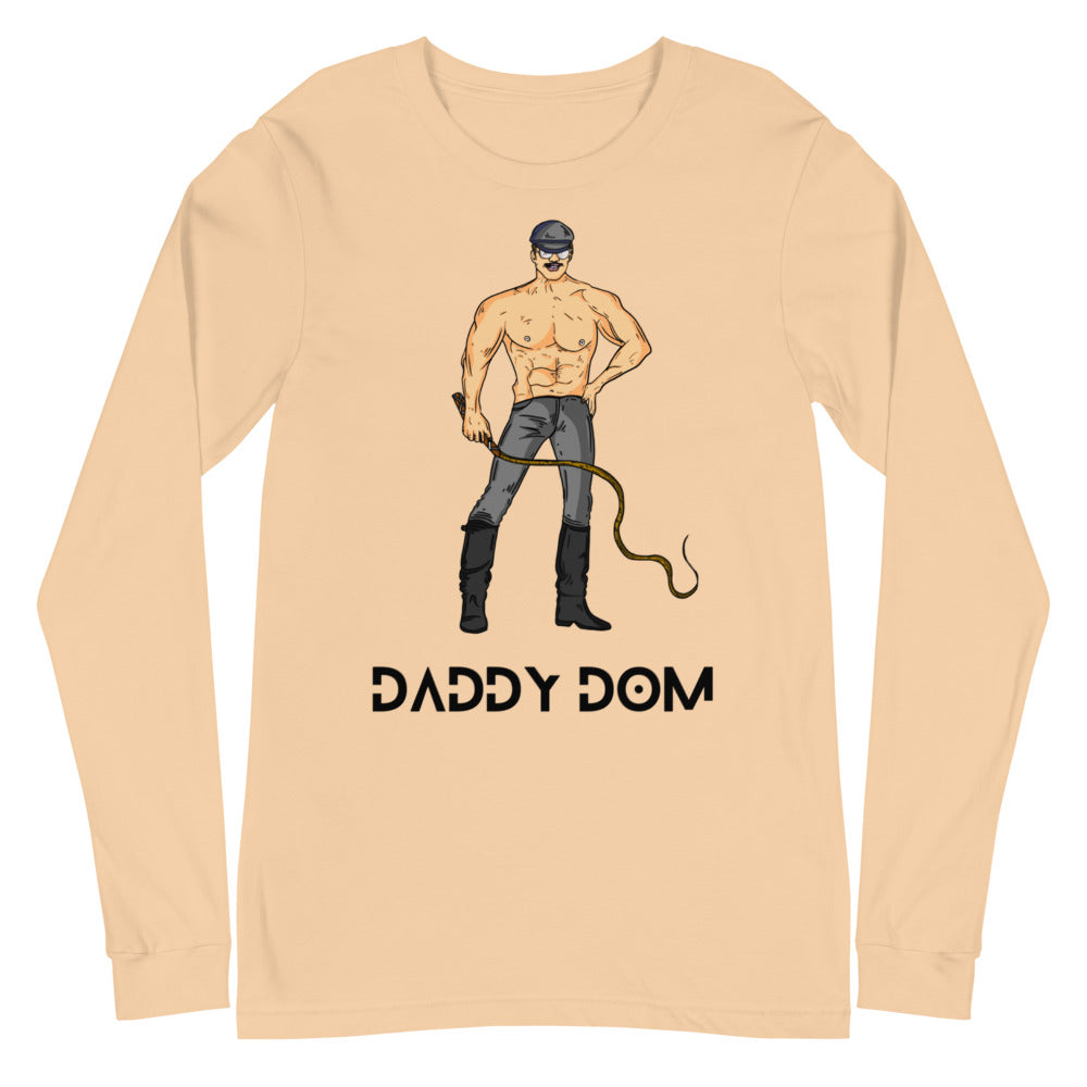 Sand-colored long-sleeve shirt with a leather-clad man, whip, and “DADDY DOM” text