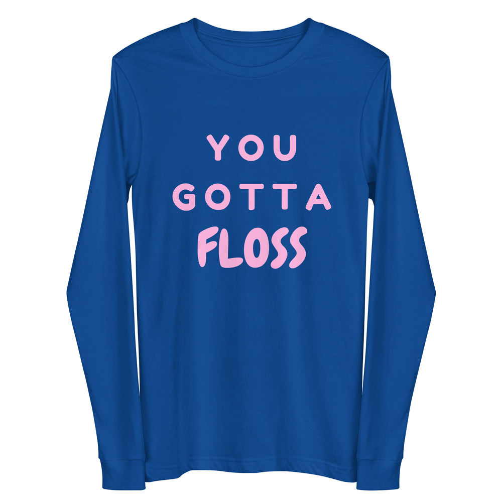 Royal-blue long-sleeve shirt with pink block lettering reading “YOU GOTTA FLOSS”