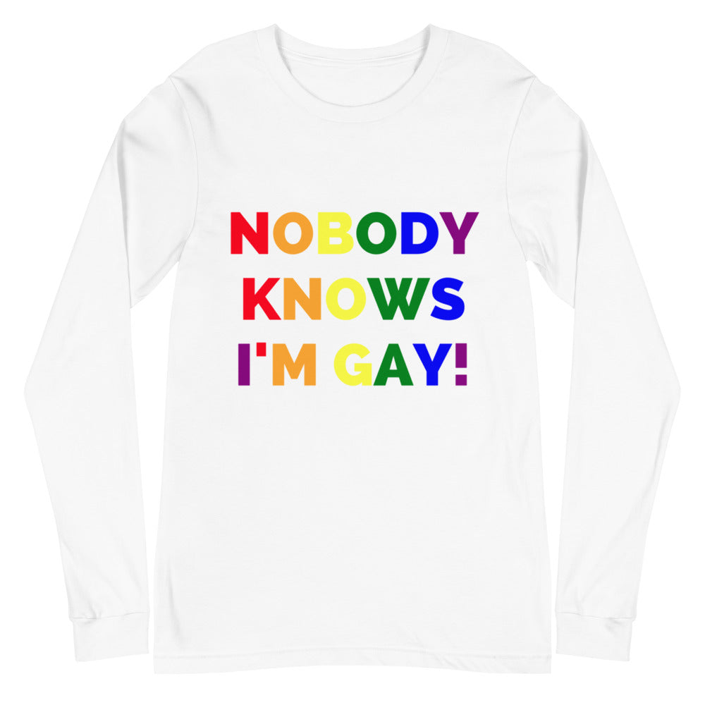 Front-view white long-sleeve shirt reading “NOBODY KNOWS I’M GAY!” in rainbow letters
