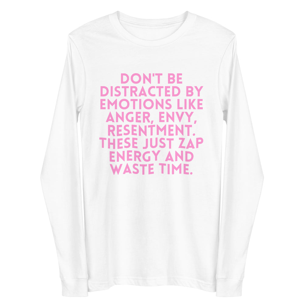 Front view of a white long-sleeve shirt with pink text, “DON’T BE DISTRACTED BY EMOTIONS LIKE ANGER, ENVY, RESENTMENT. THE...
