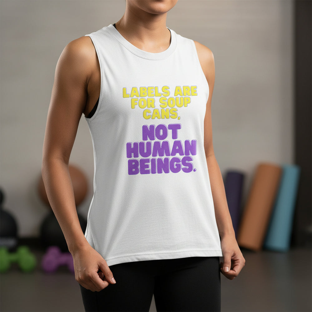 Model wearing a white sleeveless top reading “LABELS ARE FOR SOUP CANS, NOT HUMAN BEINGS.”