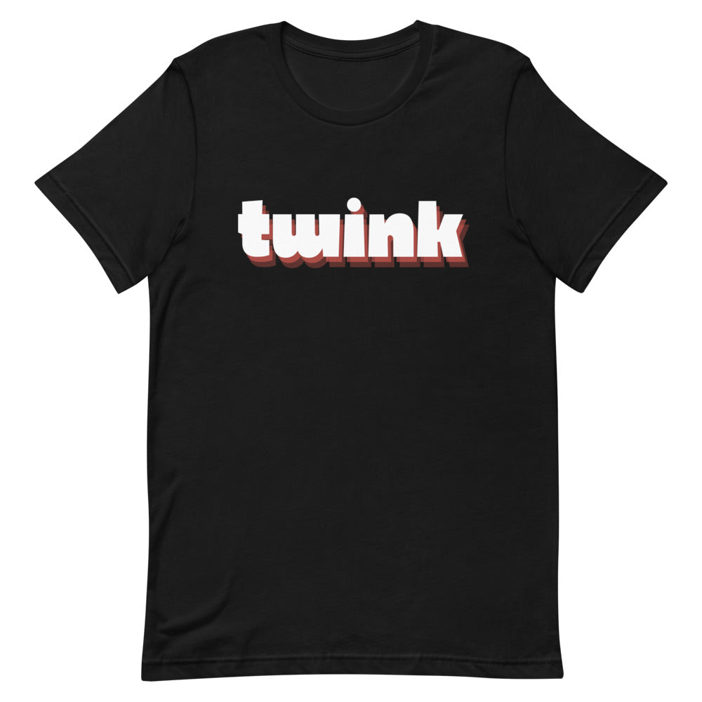 twinks tops: Black unisex LGBT t-shirt with “twink” in bold pink and white, worn by a smiling person in a bright