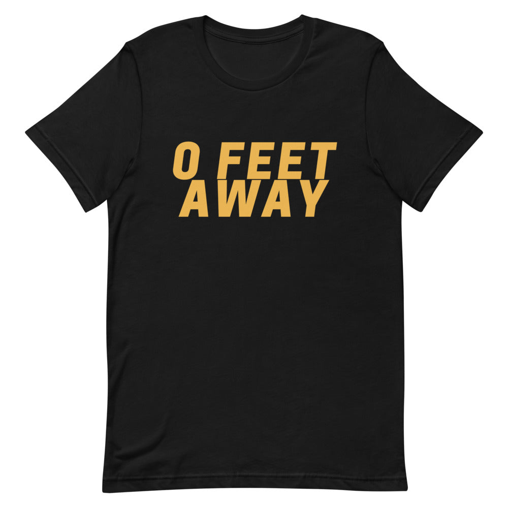 Front view of a black T-shirt reading “0 FEET AWAY” in bold gold letters