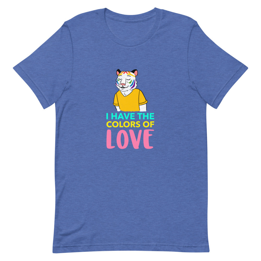 I Have The Colors Of Love" T-shirt, soft cotton with a bold, colorful cartoon tiger and text, worn by a smiling woman indoors.