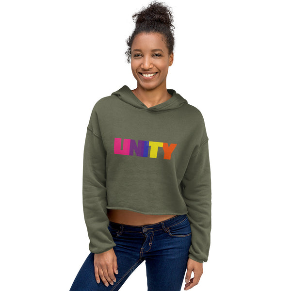 Front view of a military green cropped hoodie with multicolored “UNITY” lettering, worn with jeans