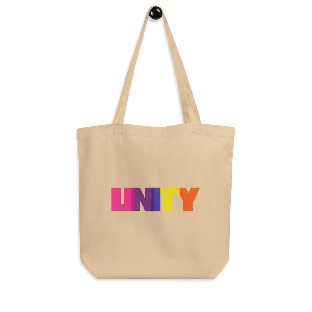 Front view of an oyster canvas tote bag with long handles and colorful UNITY lettering
