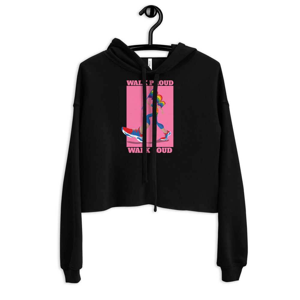 Front view of a black cropped hoodie on a hanger with pink “WALK PROUD WALK LOUD” graphic