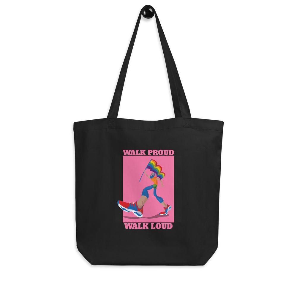 Black tote bag with pink “WALK PROUD WALK LOUD” graphic and rainbow-flag walker