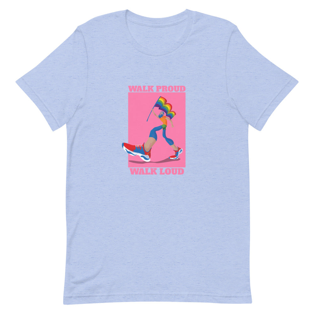 Flat-lay heather-blue T-shirt reading “WALK PROUD” and “WALK LOUD” with a rainbow-themed walker graphic