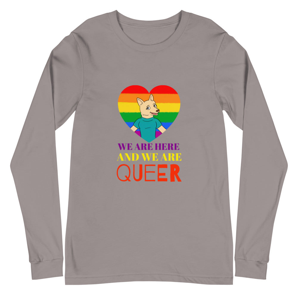 Front view of a gray long-sleeve shirt with a rainbow heart, cartoon canine, and “WE ARE HERE AND WE ARE QUEER” text