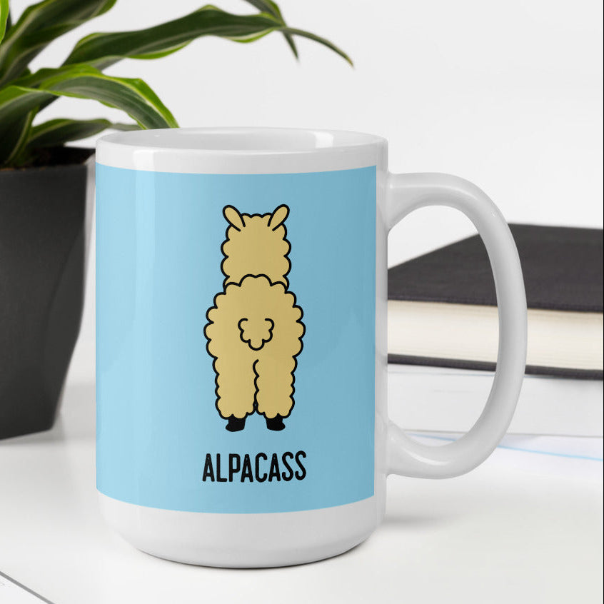 White mug with a cartoon alpaca and “ALPACASS” text on a light blue panel