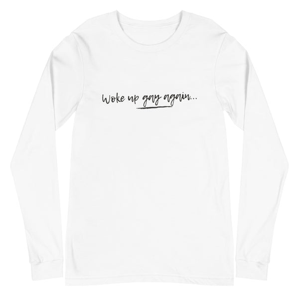 Front-facing white long-sleeve shirt reading “Woke up gay again...”