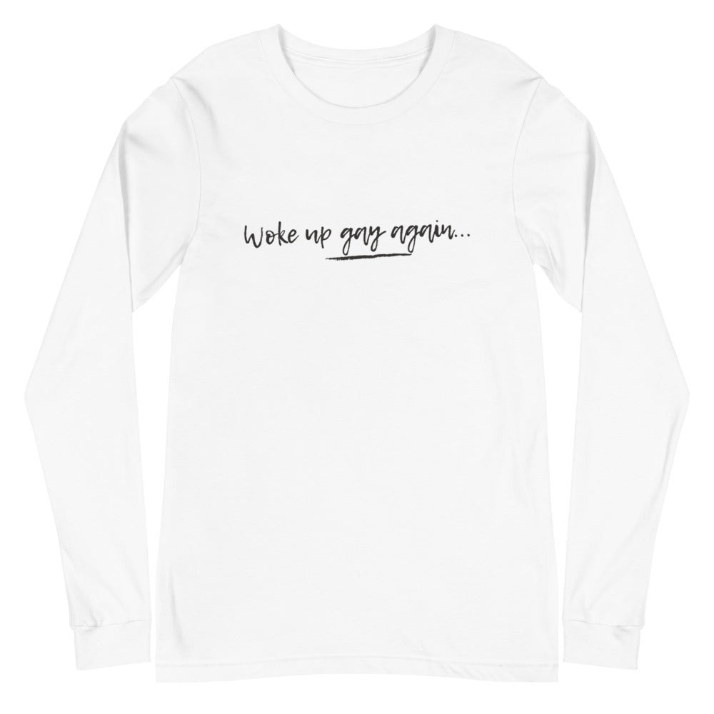 Front-facing white long-sleeve shirt reading “Woke up gay again...”