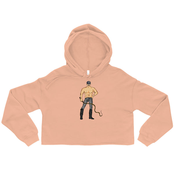 Peach cropped hoodie with a central illustration of a shirtless man holding a whip