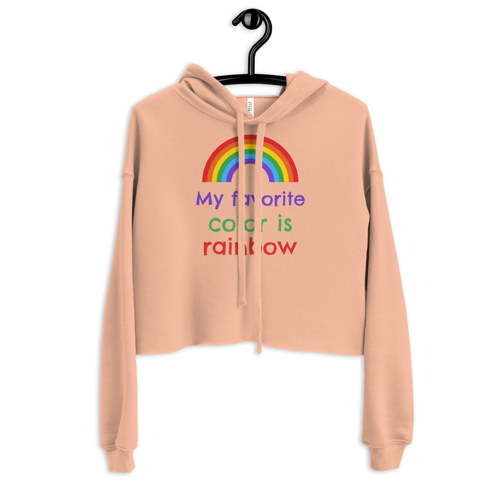 Peach cropped hoodie on a hanger with a rainbow and “My favorite color is rainbow” text