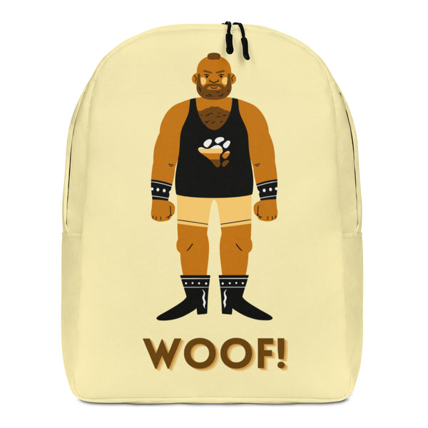 Front view of a pale yellow backpack showing a bearded bear in leather gear and “WOOF!”