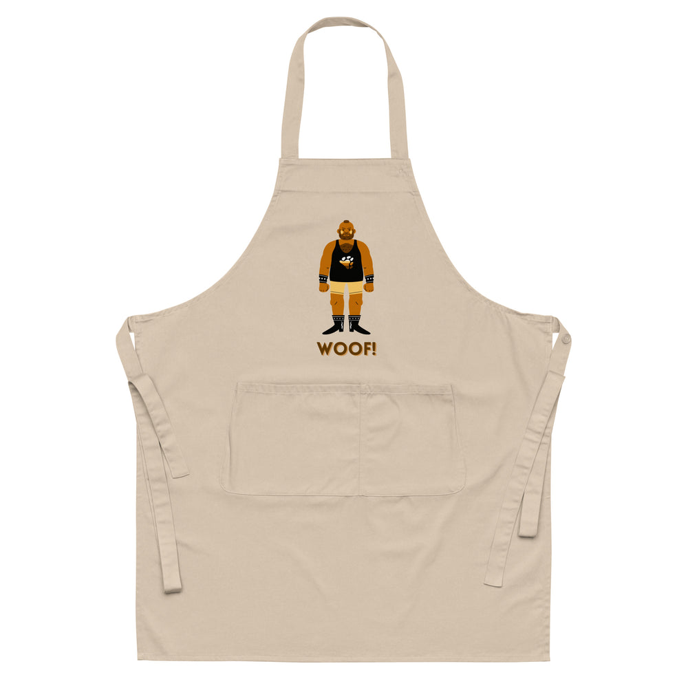 Front-facing beige apron with a bearded bear illustration and “WOOF!” text