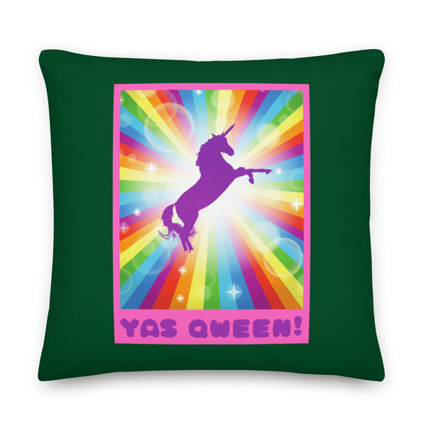 Dark green square pillow with a pink-bordered rainbow unicorn graphic and “YAS QWEEN!” text