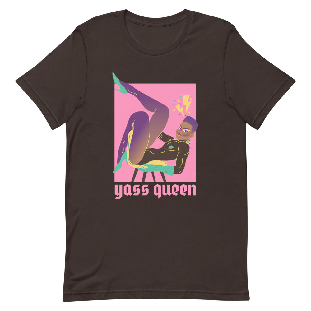 Brown T-shirt with a colorful reclining figure graphic and “Yass Queen” text
