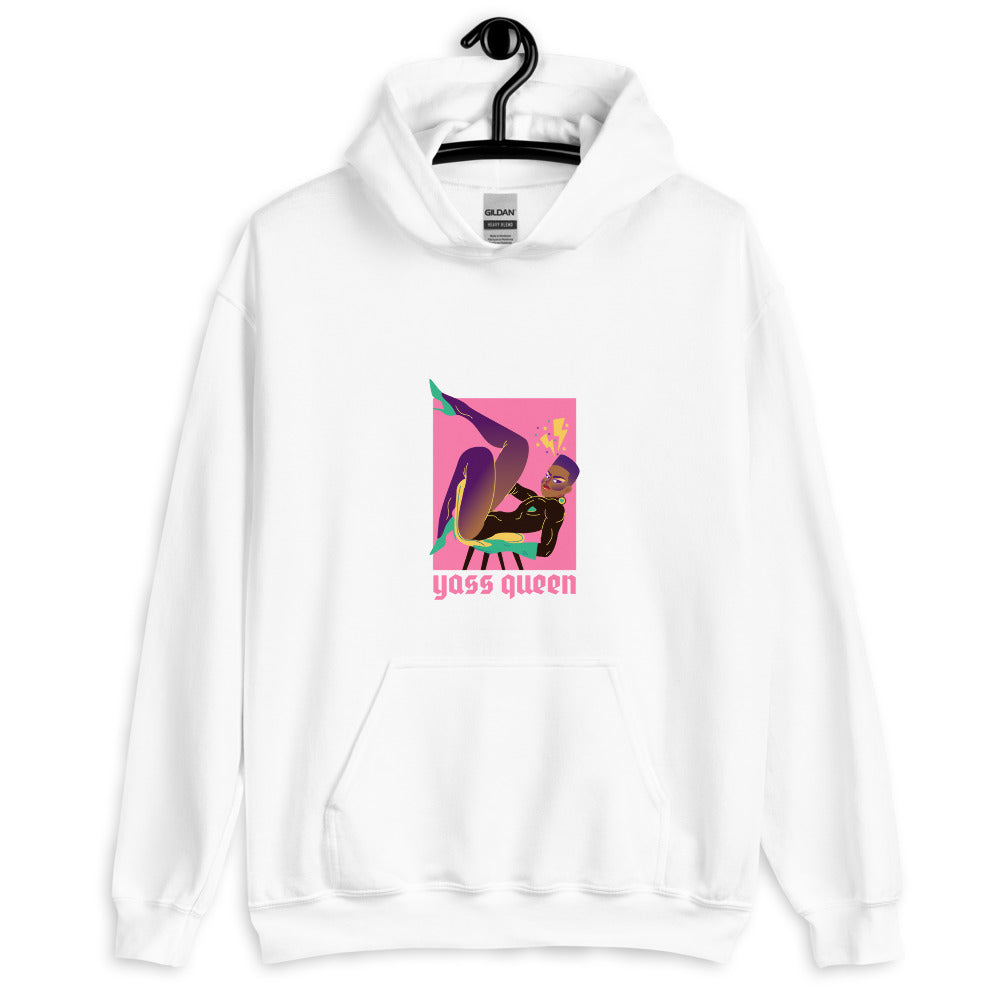 White hoodie on a hanger with a colorful seated figure and “yass queen” graphic