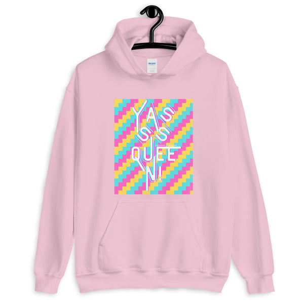 Pink pullover hoodie on a hanger with a colorful geometric “Yasss Queen!” graphic